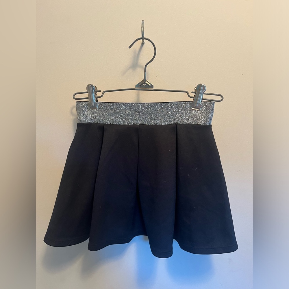Bongo, girls youth medium, black skirt with silver glittery waistband.